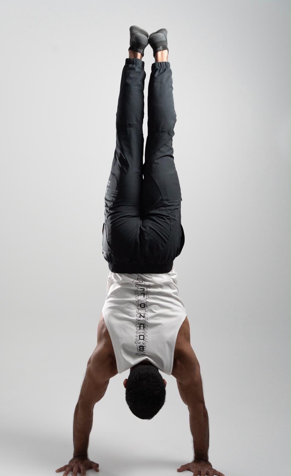 Yousef performing a handstand
